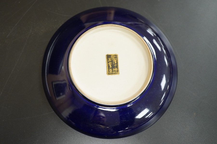 A Japanese satsuma pottery cup and saucer, saucer 14cm in diameter